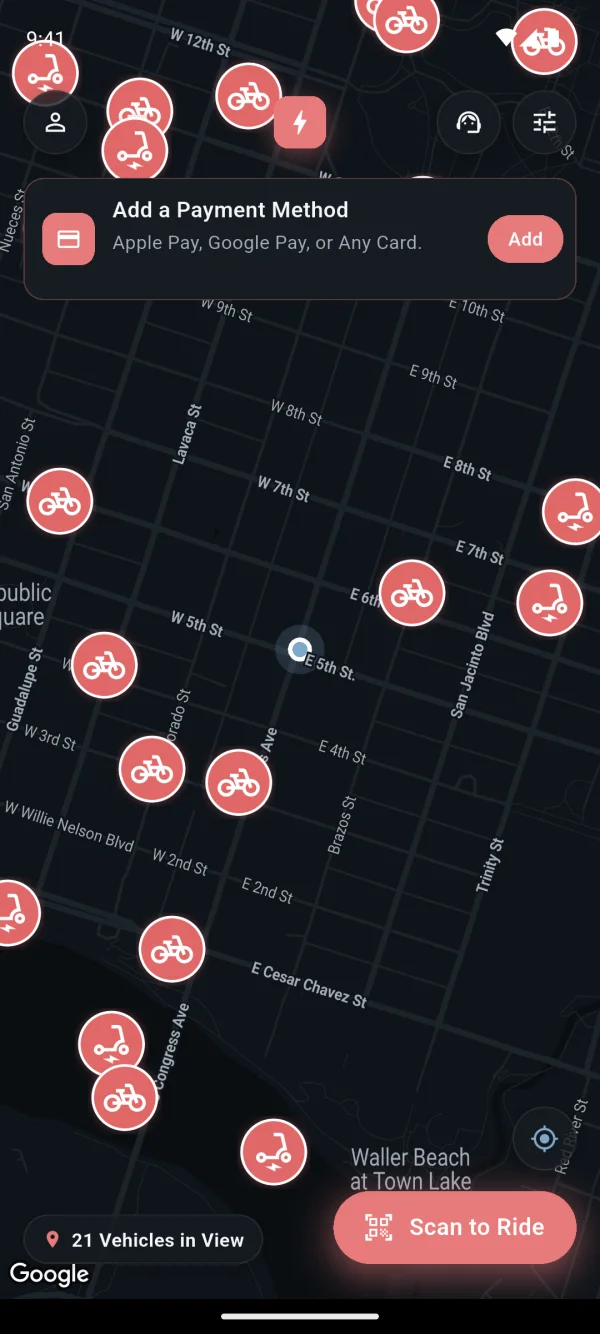 Screenshot of the Axons Mobility rider app: a map of nearby e-bikes and e-scooters with a Scan to Ride button